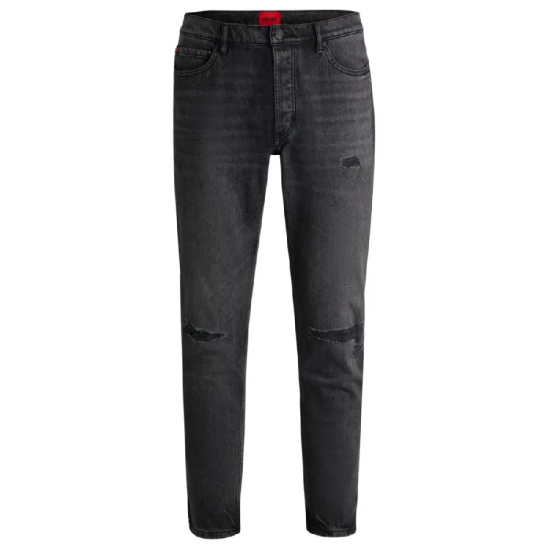 Tapered-fit jeans in black distressed denim Trendy Men's Scandinavian